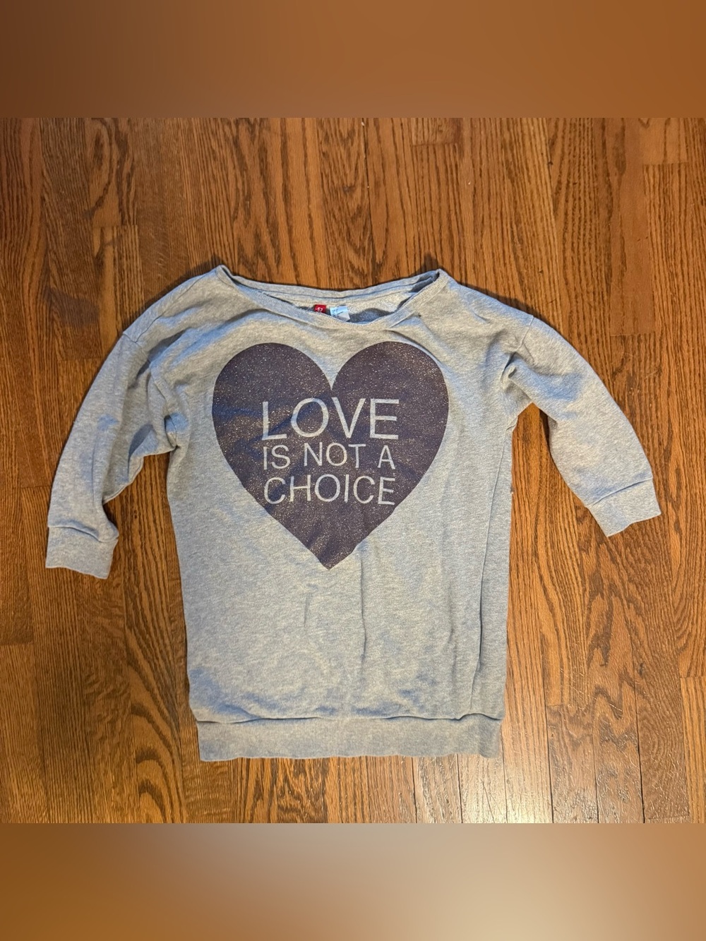 H&M women’s gray oversize "Love is not a choice" sweatshirt